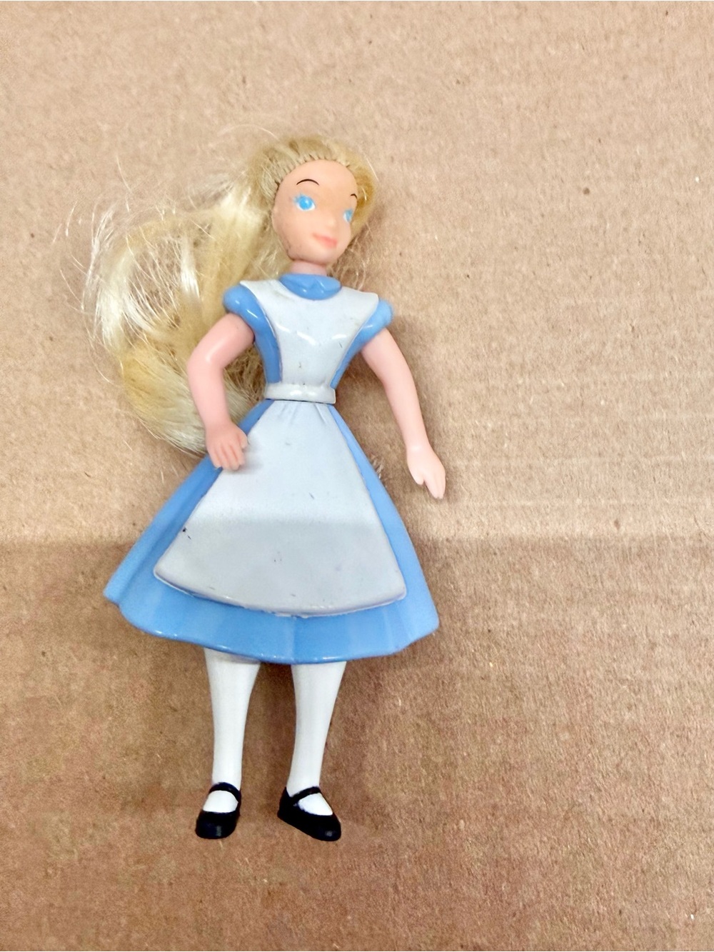 Alice from Disney's Alice in Wonderland.